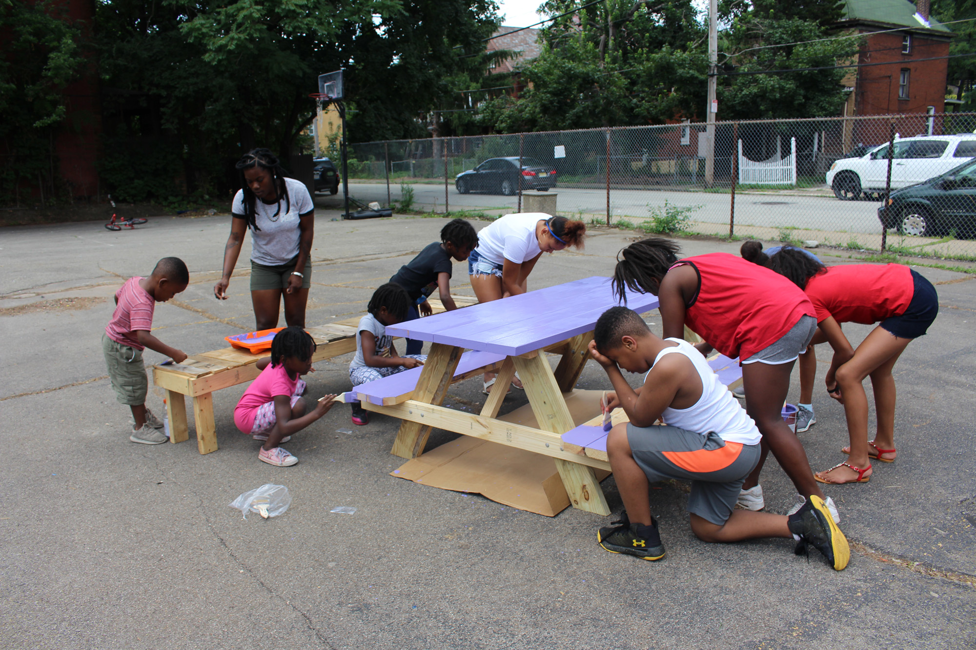 Neighborhood youth helped us write a grant for a day to clean-up the playground and build picnic benches.